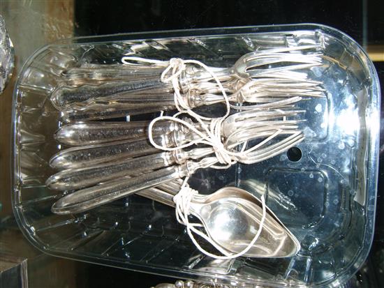 A set of 5 silver grapefruit spoons and 11 silver handled cake forks